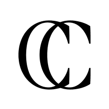 Blogger Erin Hiemstra's home office designed in a prefab container with customized shelving, built in desk and drawers by California Closets